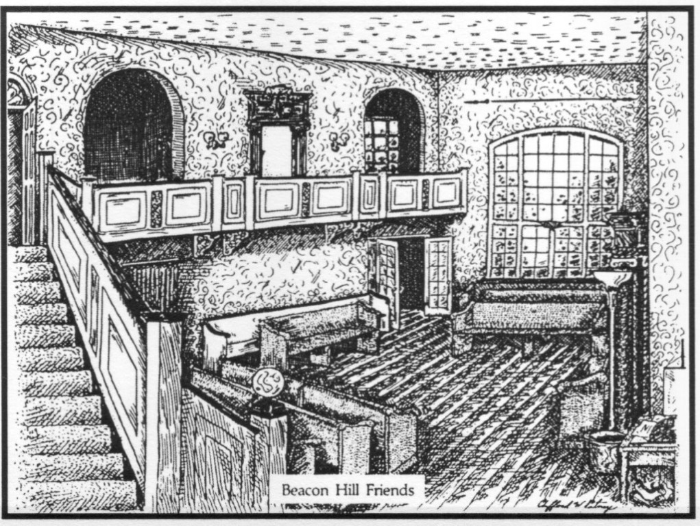 Interior view of Beacon Hill Friends House with wooden furniture and large window.