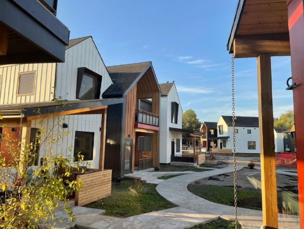 Modern cohousing homes with shared outdoor spaces in Bozeman.