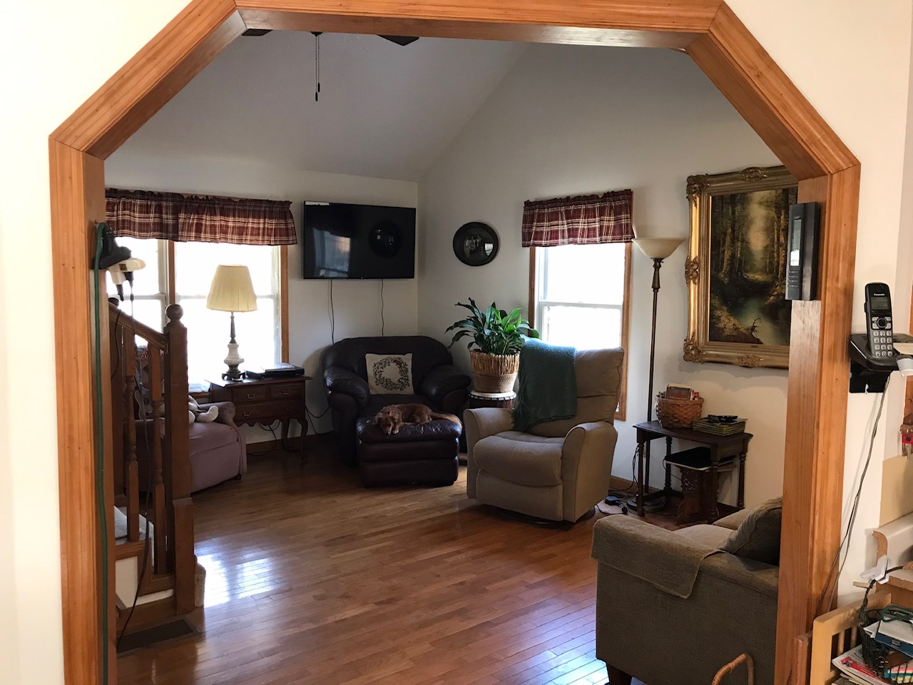 Interior of a warm, inviting living room with comfortable furniture and natural light.